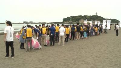 東奧宣傳結合環保 舉辦撿垃圾大賽