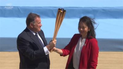 疫情籠罩下東奧聖火正式抵日本 希臘交接典禮克難離奇