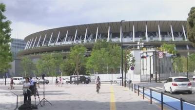 東京奧運一波三折 日奧運大臣:不計代價辦到底