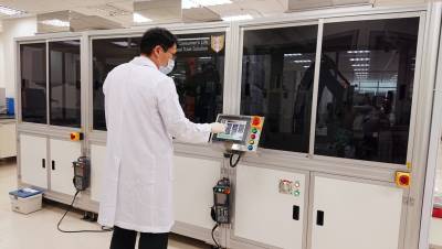 PCR檢驗不塞車 新竹臺大分院引進高通量全自動新冠病毒核酸檢測系統